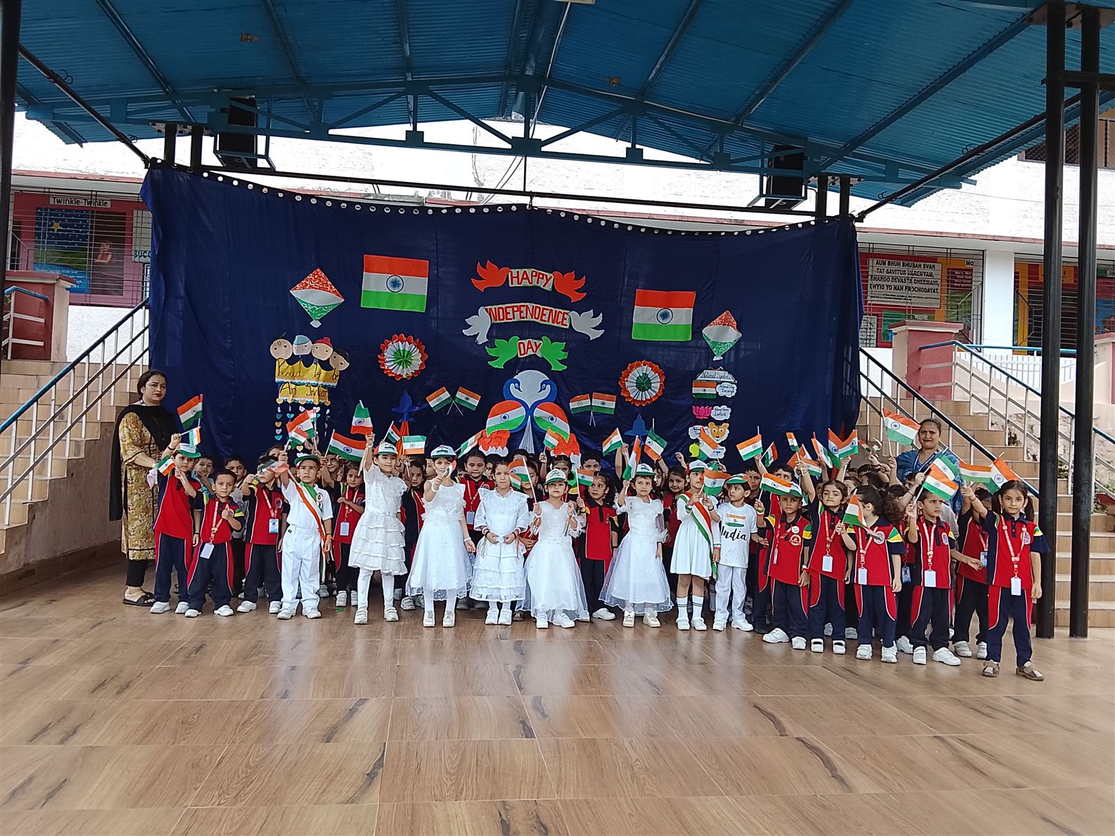 Students celebrating Independence Day on stage